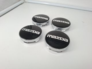 4 Coprimozzi Mazda 60mm Nuovi