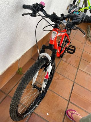 Bicicleta de montaña roja para personas de 8-12a