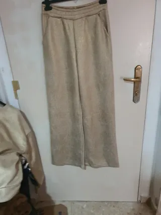 Chándal brillante dorado