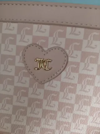 Bolso de mano Juicy Couture rosa y dorado