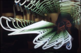 Cámara Nikon EM + Accesorios