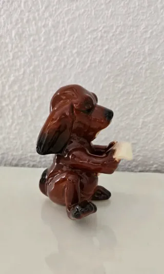 Figura vintage Goebel Perro con periódico