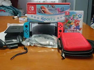 Nintendo Switch + Juegos y Accesorios