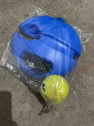 Entrenador de pádel con pelota