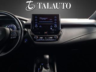 Toyota Corolla 1.8 125H BUSINESS PLUS E-CVT TOU SPORT