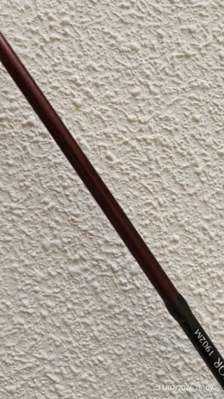 Caña de pescar y carrete casting