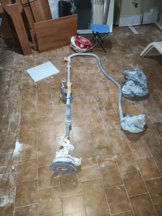 Lijadora jirafa con aspiración