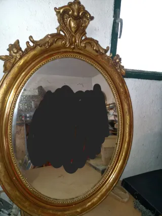 Espejo antiguo dorado ovalado