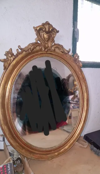 Espejo antiguo dorado ovalado