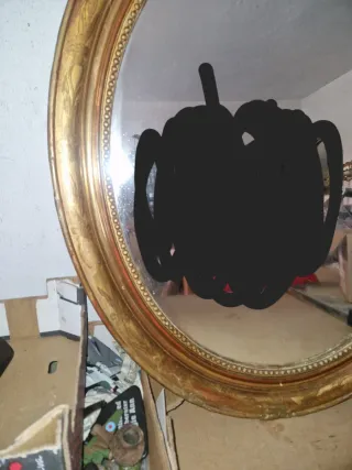 Espejo antiguo dorado ovalado