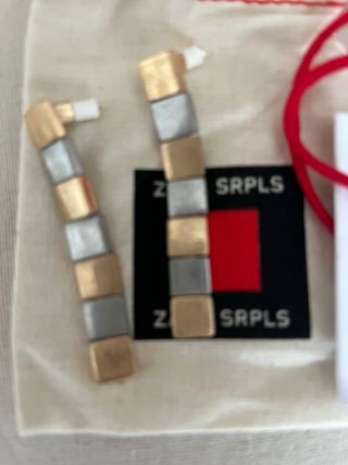 Pendientes largos Zara dorados y plateados