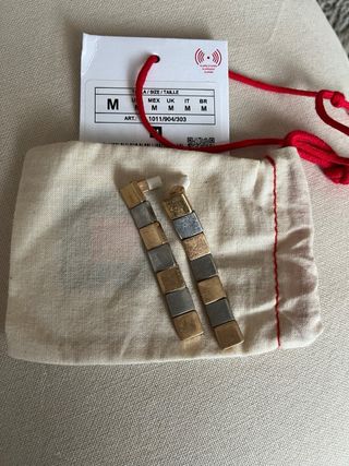 Pendientes largos Zara dorados y plateados