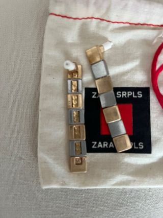 Pendientes largos Zara dorados y plateados