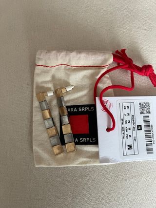 Pendientes largos Zara dorados y plateados