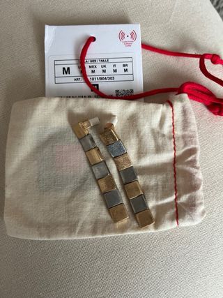 Pendientes largos Zara dorados y plateados