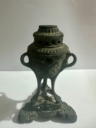 Elegante lumicino in bronzo