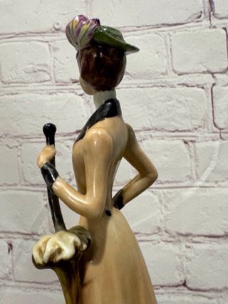 Figura de porcelana antigua mujer