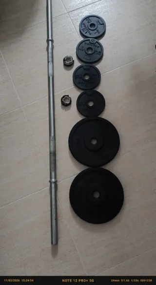 Barra de pesas con discos