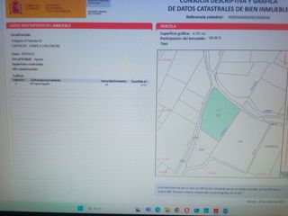 Parcela rústica de 4.757 m2 con agua