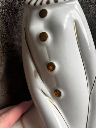 Figuras de porcelana dorada