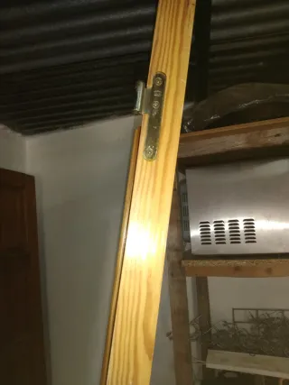 Puerta de entrada de madera