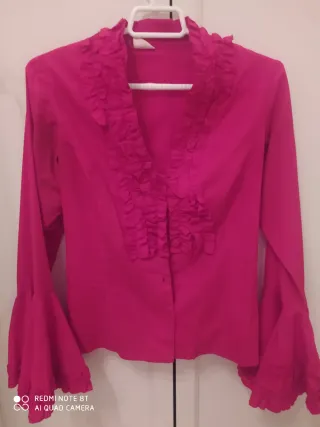 Blusa rosa con volantes