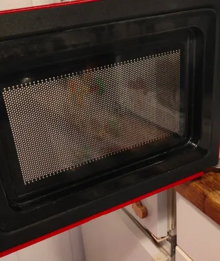 Forno a microonde Candy rosso