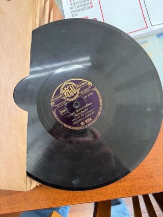 12 Discos antiguos entre 1930 y 1965 .