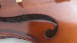 Violín con funda y arco