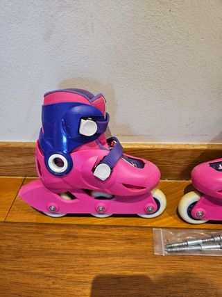 Patines niña iniciación rosa + kit estabilidad