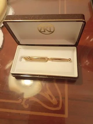 Pisa corbatas chapado en oro