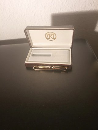 Pisa corbatas chapado en oro
