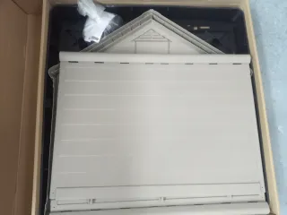 Caseta para perro gris y blanca