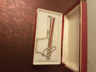 Pisa corbatas de metal bañado en plata rodiada