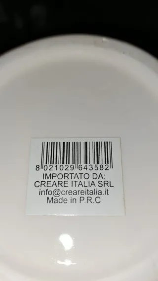 Zuccheriera arancione con cucchiaino