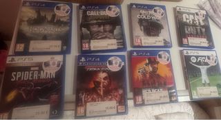 Consola PS5 + 8 Juegos PS4/PS5 2 años de garantia.