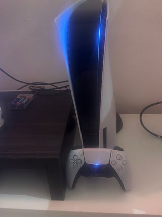 Consola PS5 + 8 Juegos PS4/PS5 2 años de garantia.