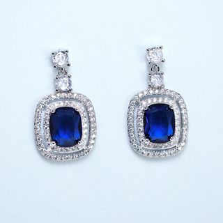 Pendientes circonita azul y blanca.