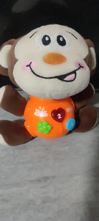 Juguete musical de mono para bebé