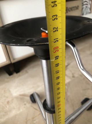 Base de silla con amortiguador y ruedas cromado.