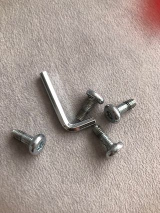 Base de silla con amortiguador y ruedas cromado.