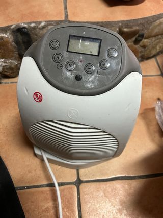 Calefactor blanco y gris