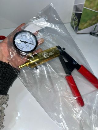 Bomba de vacío manual con manómetro