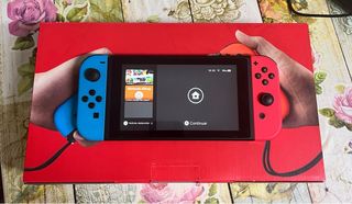 Nintendo Switch con caja y accesorios