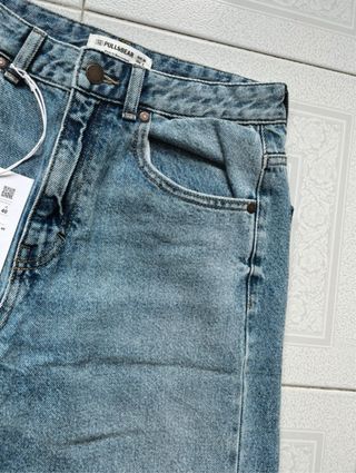 Calça de ganga azul perna larga