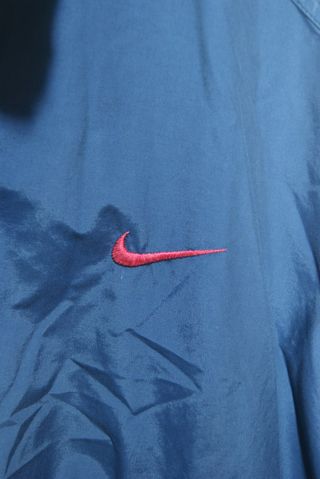Giacca a vento Nike vintage blu/rossa taglia M