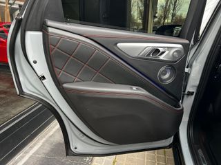 BMW XM 550 KW 748CV LABEL RED