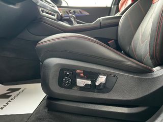 BMW XM 550 KW 748CV LABEL RED