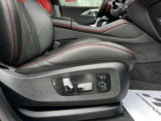 BMW XM 550 KW 748CV LABEL RED