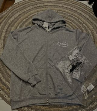 Sudadera Corteiz gris con cremallera